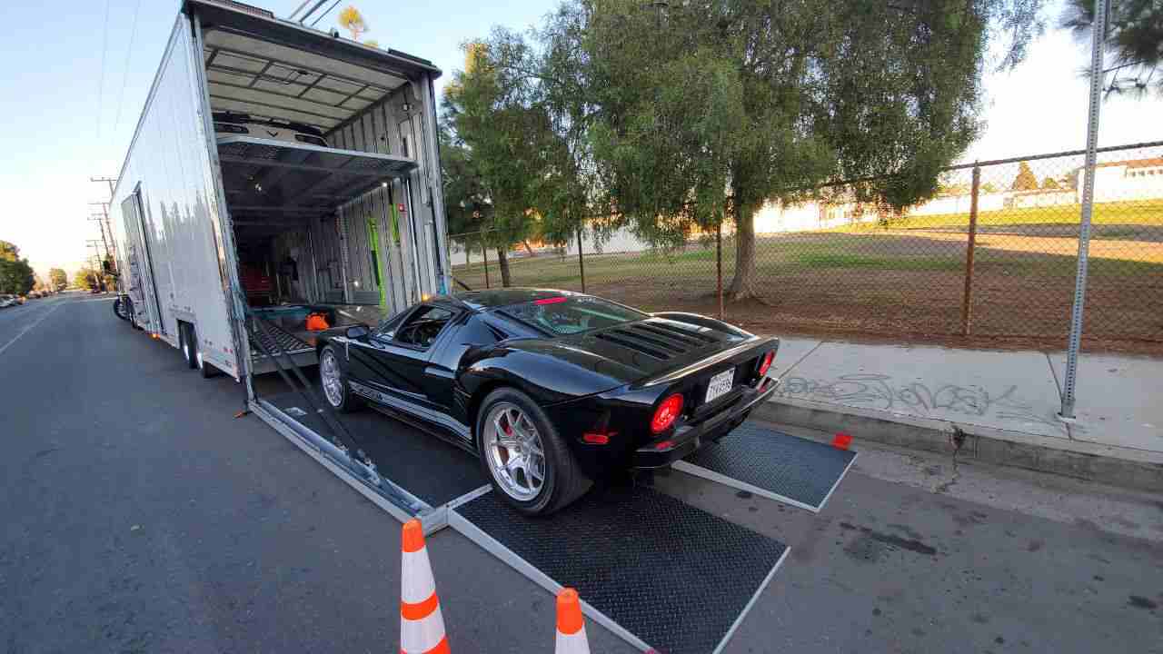 You are currently viewing How Enclosed Transport Can Protect Your Car